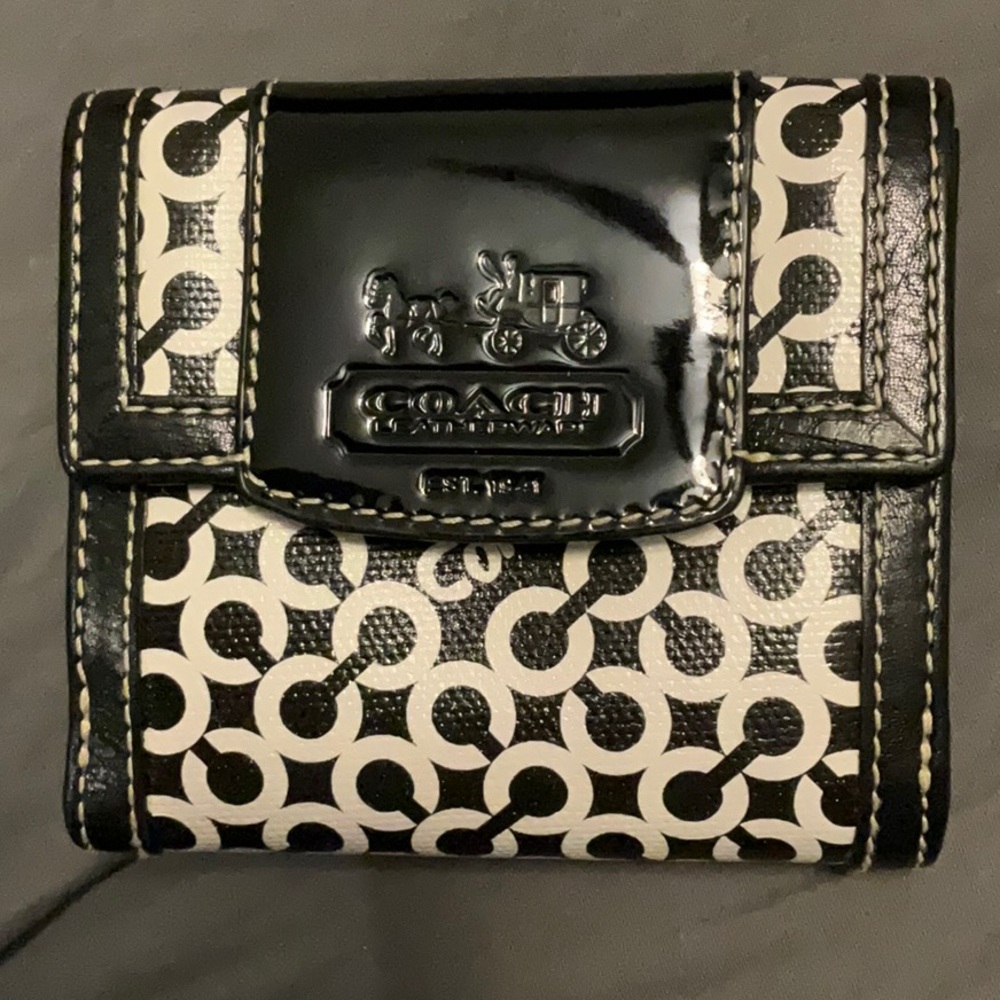 Coach Black and White Billfold Wallet.